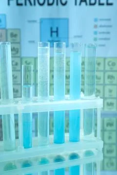 Test tubes in rack on mirror surface against periodic table of chemical ele.. 写真素材