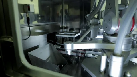 Test Tubes on Robotic Conveyor. Stock Footage 73924016