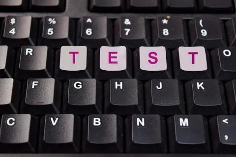 Test write on keyboard isolated on laptop background Stock Photos