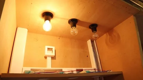 Testing of 3 light bulbs Stock Footage 61129439