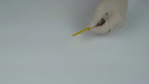 Testing Acid PH with pipette Stock Footage 119524128