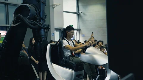 Testing Advanced Car Simulator at 2019 International Auto Show in Stock Footage 109475764