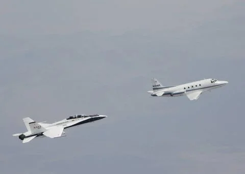 Testing autonomous software for AARD program using a NASA F/A-18 845 follo... Stock Photos