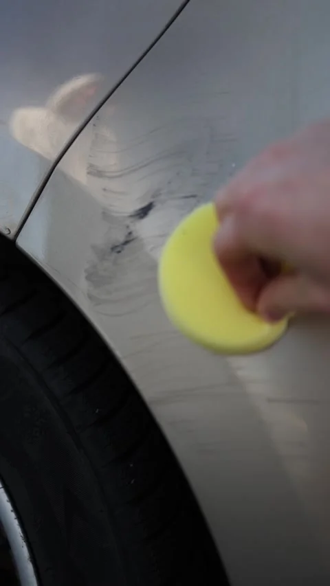 Testing car scratch remover that fails to hide visible paint damage Stock Footage 345992749