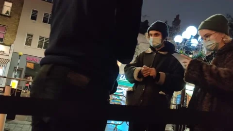 TESTING CENTER PEOPLE QUEUE FOR COVID-19 TESTS AT SAME DAY SITE LONDON UK 4K Stock Footage 145419826