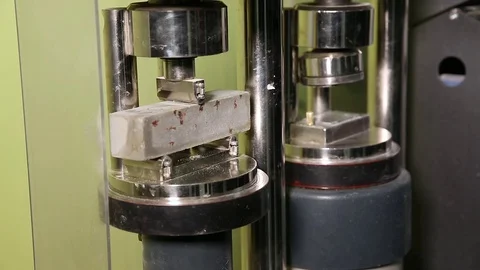 Testing of concrete samples for strength Stock Footage 82696957