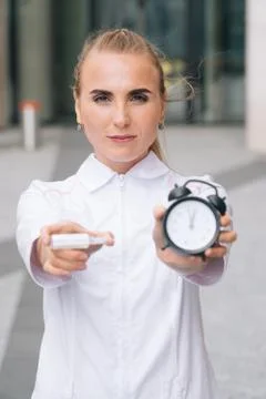 Testing for coronavirus. In the hand is a test tube with a sample of the pati Stock Photos