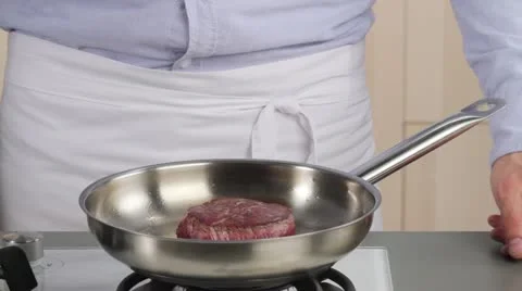 Testing the doneness of a fillet steak using the finger method (rare) Stock Footage 24657044