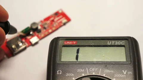 Testing of electrical board a digital multimeter Video stock 37803064