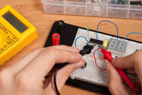 Testing electrical circuit on breadboard Stock Photos