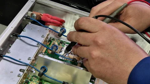 Testing of electronic components with a multimeter Stock Footage 92210598