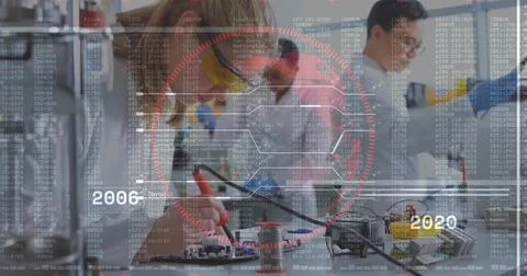 Testing engineer in lab coat probing circuit board at lab bench, with code Stock Photos