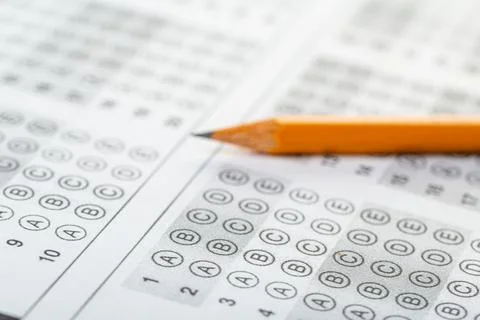 Testing in exercise and exam paper. computer sheet with pencil in school test Stock Photos