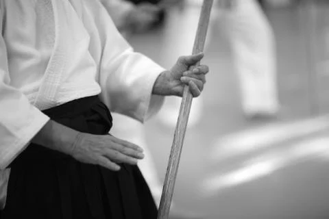 Testing of fighting techniques with a sword in aikido Stock Photos