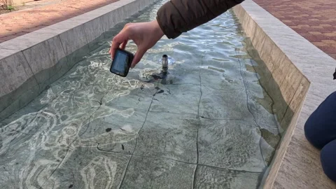 Testing gopro 11, immersion in water, fountain, shooting underwater, summer Stock Footage 243684217
