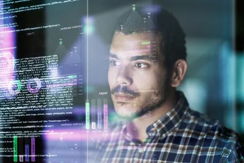 Testing his code. Cropped shot of a young computer programmer looking through Stock Photos