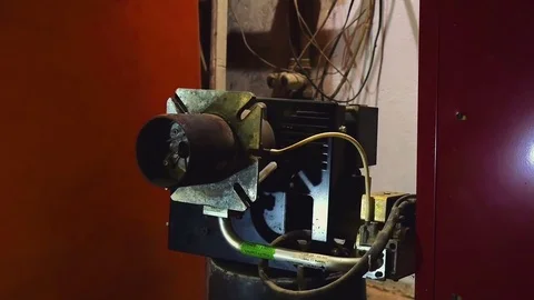 Testing home heating gas burner ignition electrode spark. Stock Footage 81808855