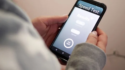Testing the Internet Speed on a Smartphone Device Stock Footage 122401898