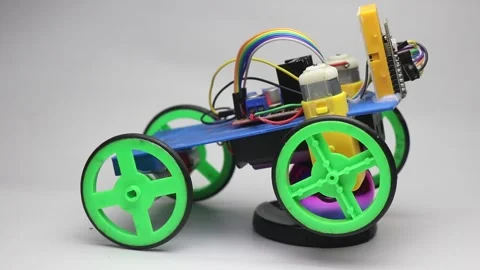 Testing the Iot robot car working model. Phone controlled robotic car Stock Footage 293061016
