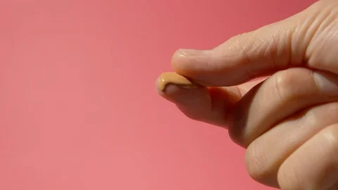 Testing Liquid foundation on fingers 스톡 동영상 124694380