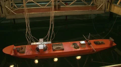 Testing the model of a ship in the pool. Video stock 11293871