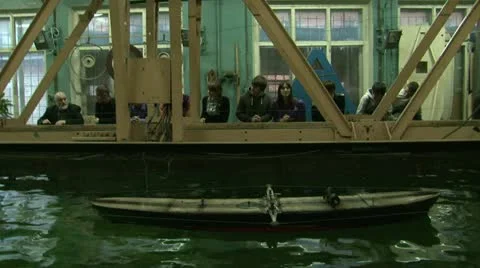 Testing the model of a ship in the pool. Video stock 11293981