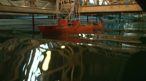 Testing the model of a ship in the pool. Video stock 11294126