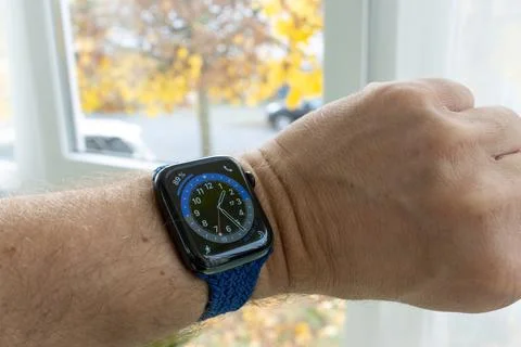 Testing the new watch faces on the all new Apple Watch Series 6. Stock Photos