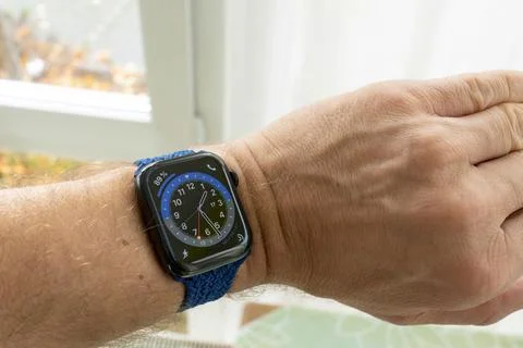 Testing the new watch faces on the all new Apple Watch Series 6. Stock Photos