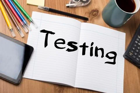 Testing - Note Pad With Text On Wooden Table Stock Photos
