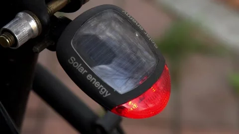 Testing out the rear safety lights on a bicycle Stock Footage 255497402