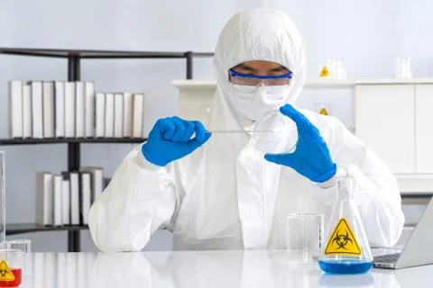 Testing process in a laboratory preventing the spread of viral research. Stock Photos