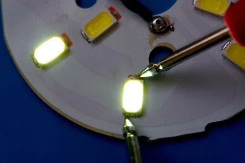 Testing SMD Led diodes with a voltmeter Stock Photos