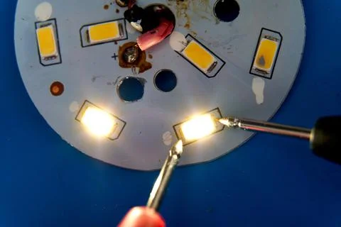 Testing SMD Led diodes with a voltmeter Stock Photos