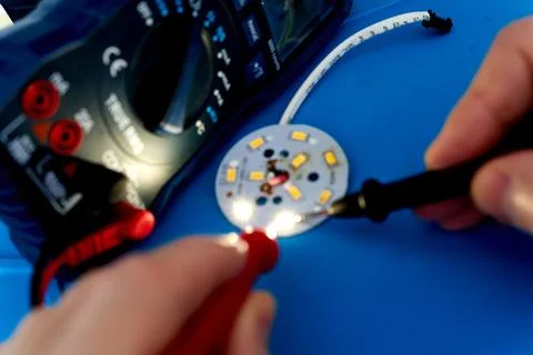 Testing SMD Led diodes with a voltmeter Stock Photos