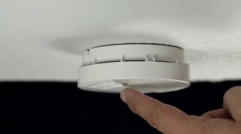 Testing a smoke detector on the ceiling Stock-Footage 36788055