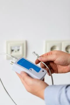 Testing structured cabling using qualified cable performance tester. Stock Photos