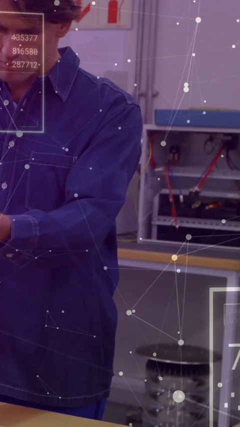 Testing tech wearing work shirt adjusting probe and leads at workshop bench, Stock Footage 334546967