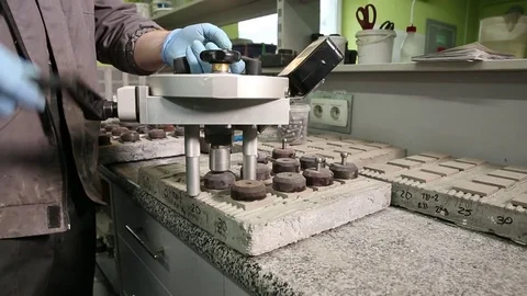 Testing of tile adhesive samples for strength Video stock 82697270