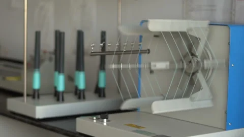 Testing of tops and threads in the laboratory 3 Stock Footage 99706073