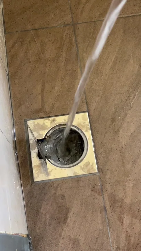 Testing Water Drainage System In Bathroom Floor Drain Stock Footage 330987933