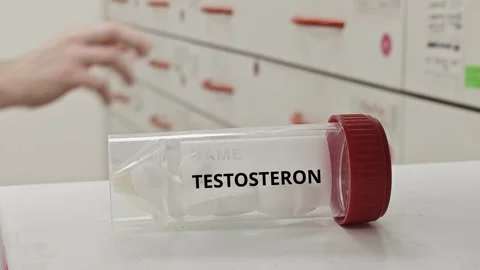 TESTOSTERON tablets used for hormone replacement therapy in androgen deficien Stock Footage 332479841