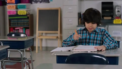 Tests on desks in empty classroom spacious chemistry classroom of contemporar Stock Footage 256720286