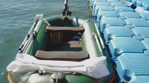 Tethered inflatable boat Stock Footage 106410758