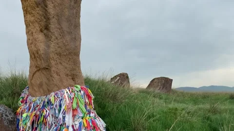 Tetrahedral earthen pyramids surrounded by a stone fence. Video stock 155971456