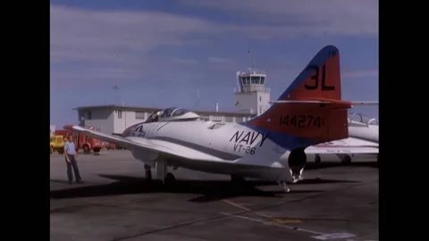 TEXAS - 1968 - The plane captain directs the pilot with hand signals. The Stock Footage 312792481
