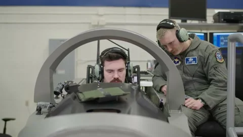 TEXAS - 5.7.2025 - A pilot trains on a flight simulator at Sheppard Air Force Stock Footage 312862894