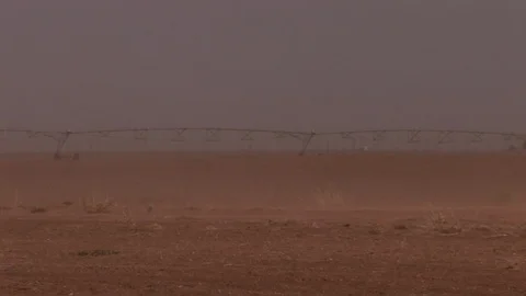 Texas farm with a center pivot almost obscured by blowing dust. Stock Footage 88745876