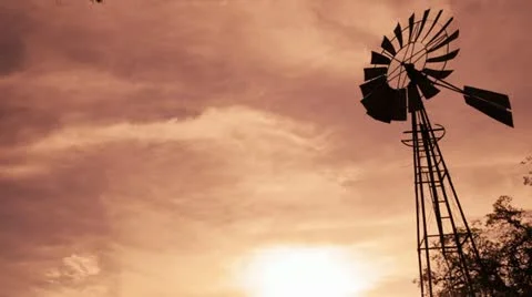 Texas farm windmill at dusk Stock Footage 22241568