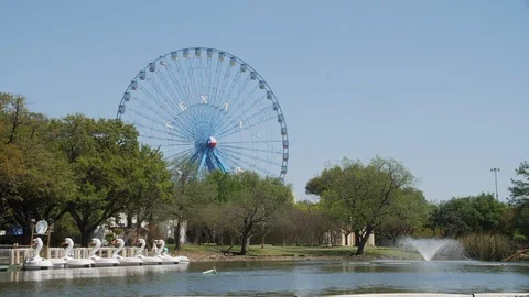 Texas Ferris Wheel at the State Fair Park in Super Slow Motion Stock Footage 128638529